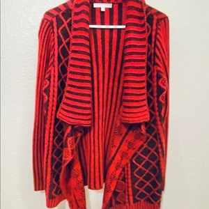 A medium Red cardigan sweater from NY collection